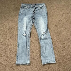 32 x 30 Light blue slim straight bootcut jeans with ripped details